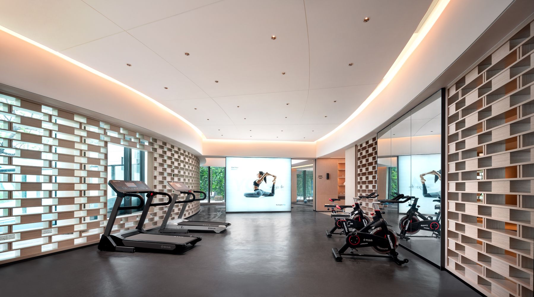 A quiet, modern training space with performance equipment
